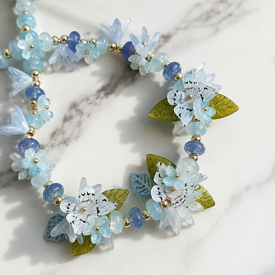 Botanical Blue Butterfly Necklace – Handcrafted Floral Statement Necklace